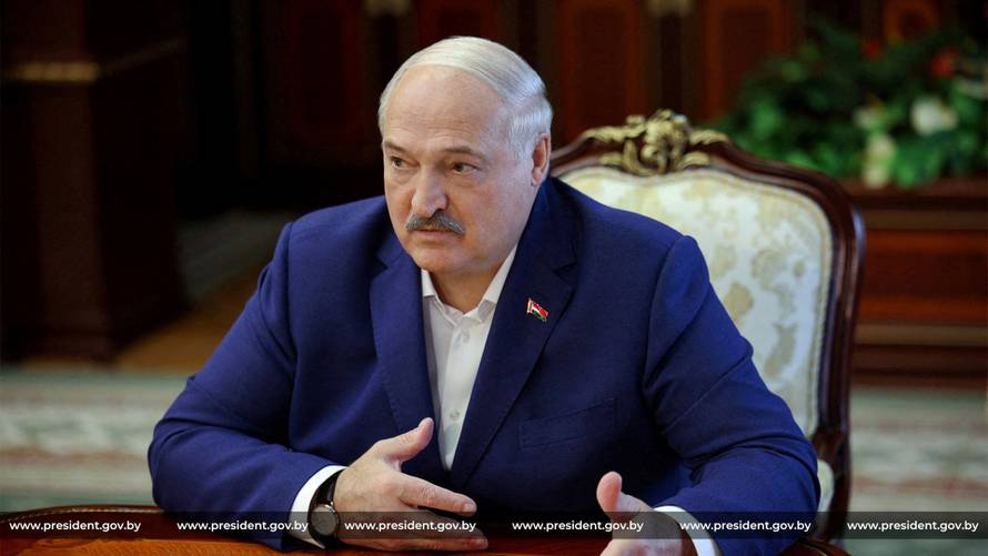 FILE PHOTO: Belarusian President Alexander Lukashenko meets with John Coale, a representative of U.S. President Donald Trump, in Minsk