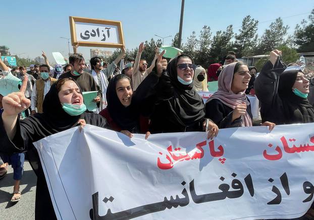 Afghan demonstrators shout slogans during an anti-Pakistan protest, near the Pakistan embassy in Kabul, Afghanistan