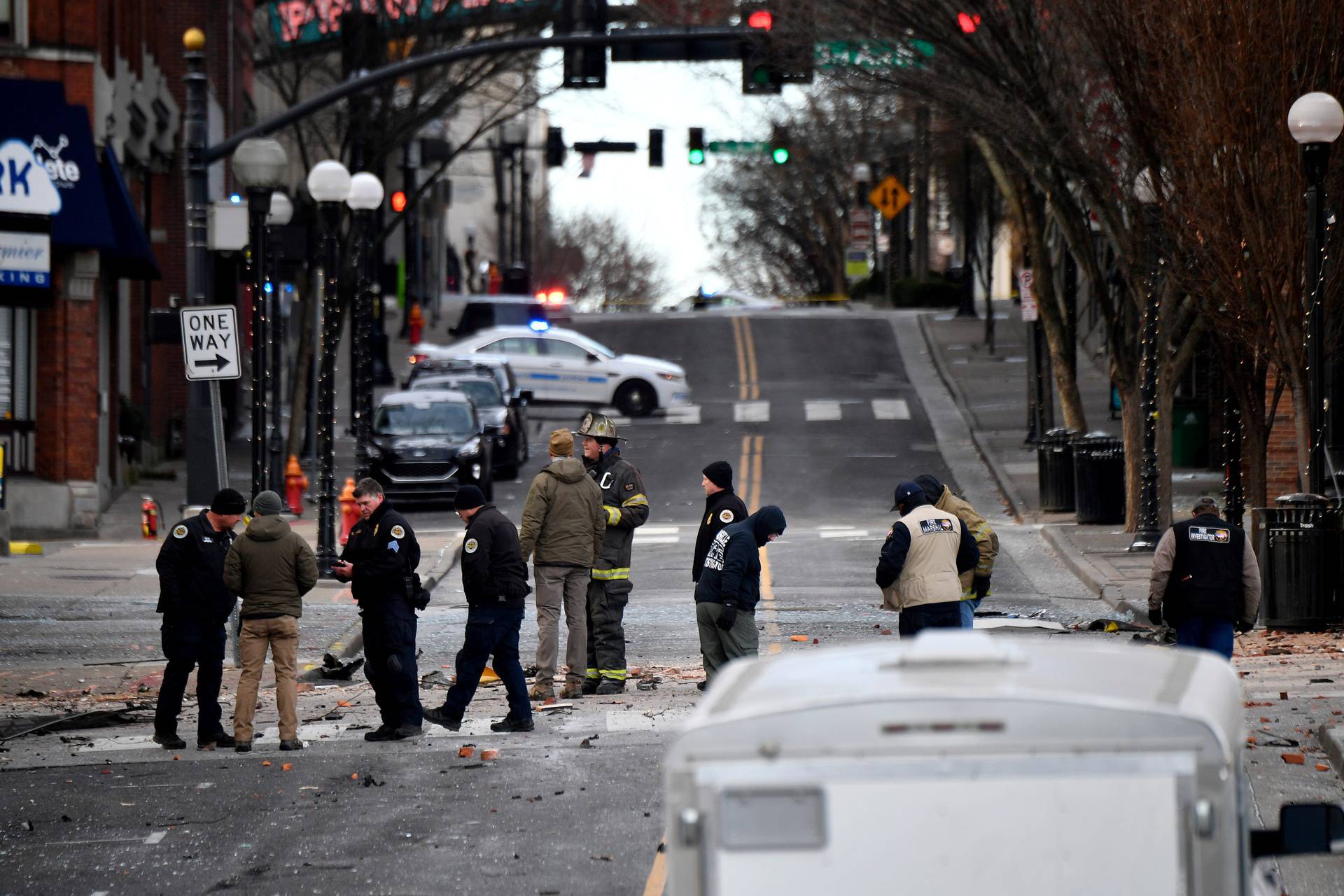 Debris litters the road near the site of an explosion in the area of Second and Commerce in Nashville