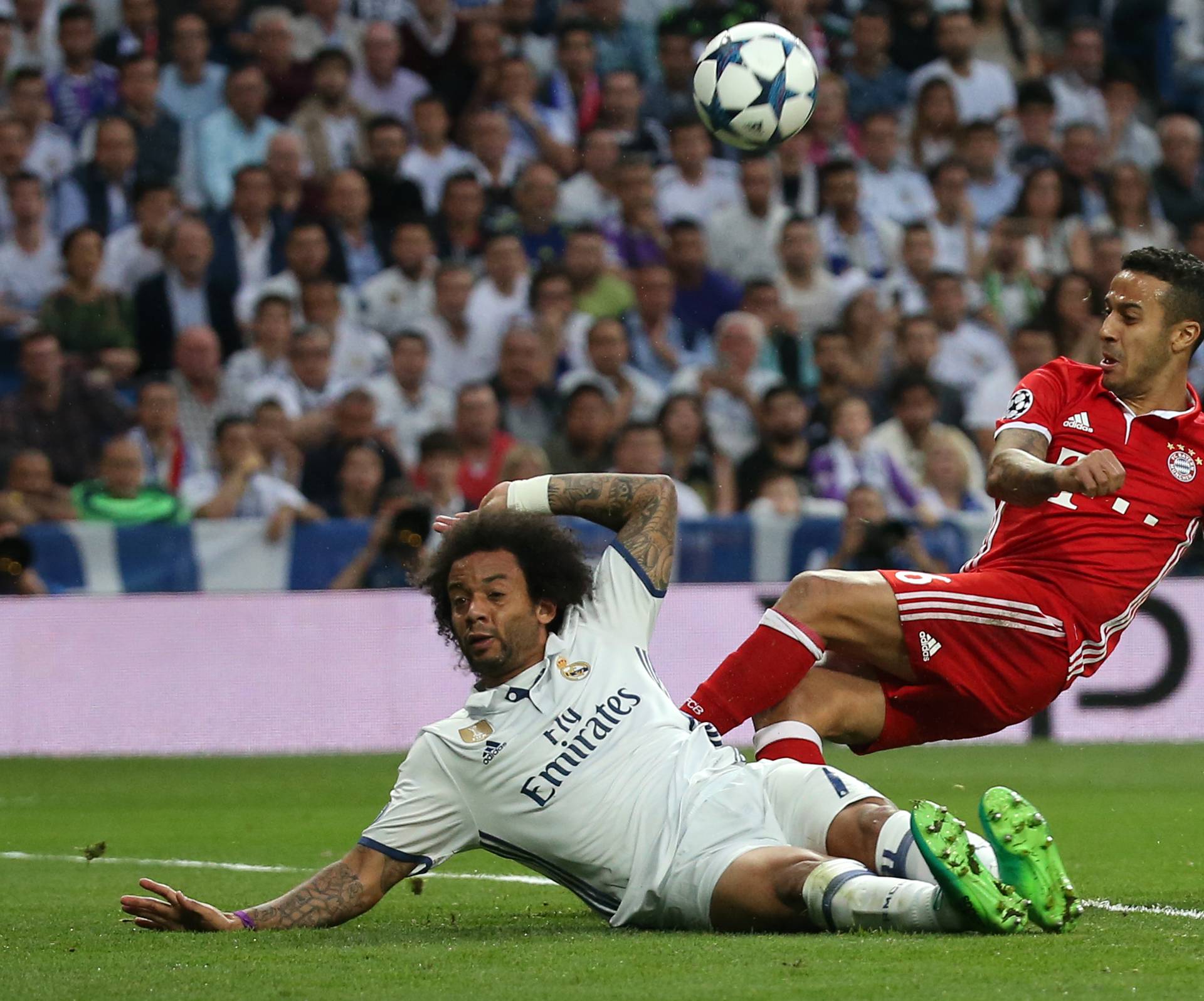 Real Madrid's Marcelo blocks the shot of Bayern Munich's Thiago Alcantara