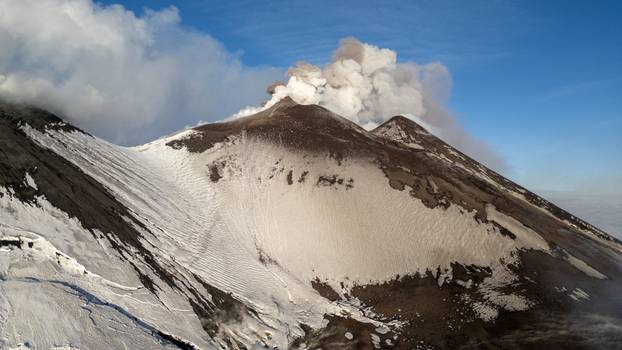 Italy's Mount Etna erupts