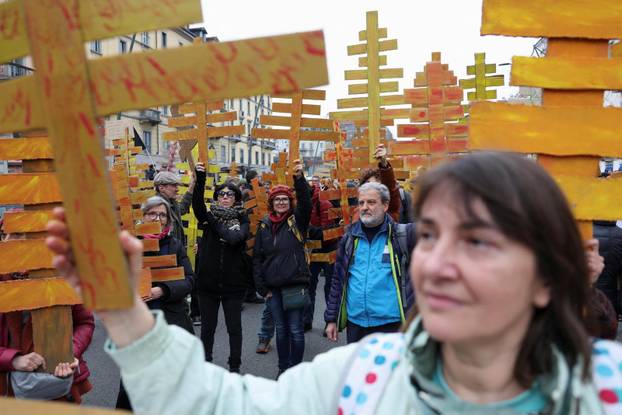 Demonstrators protest the 2026 Winter Olympics in Milan
