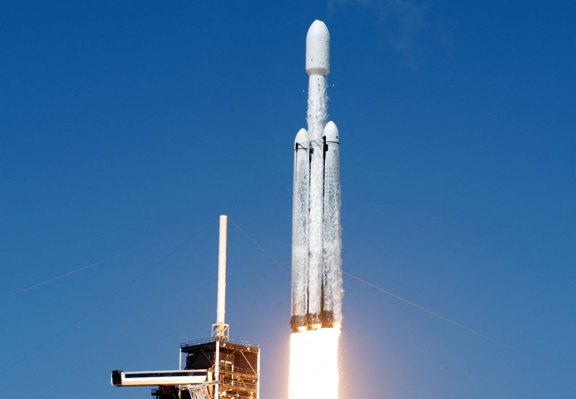 A SpaceX Falcon Heavy rocket is launched for the Europa Clipper mission to study one of Jupiter's 95 moons, at the Kennedy Space Center