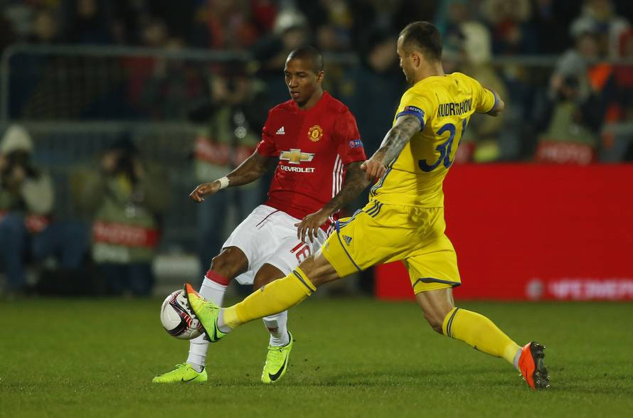 Manchester United's Ashley Young in action with FC Rostov's Fyodor Kudryashov