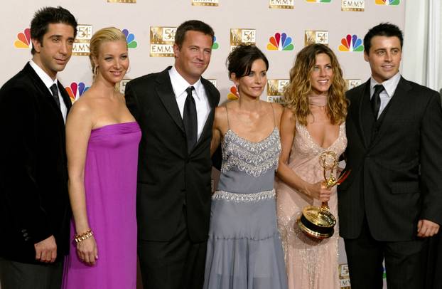FILE PHOTO: Friends cast appears with winner Jennifer Aniston at Emmy Awards