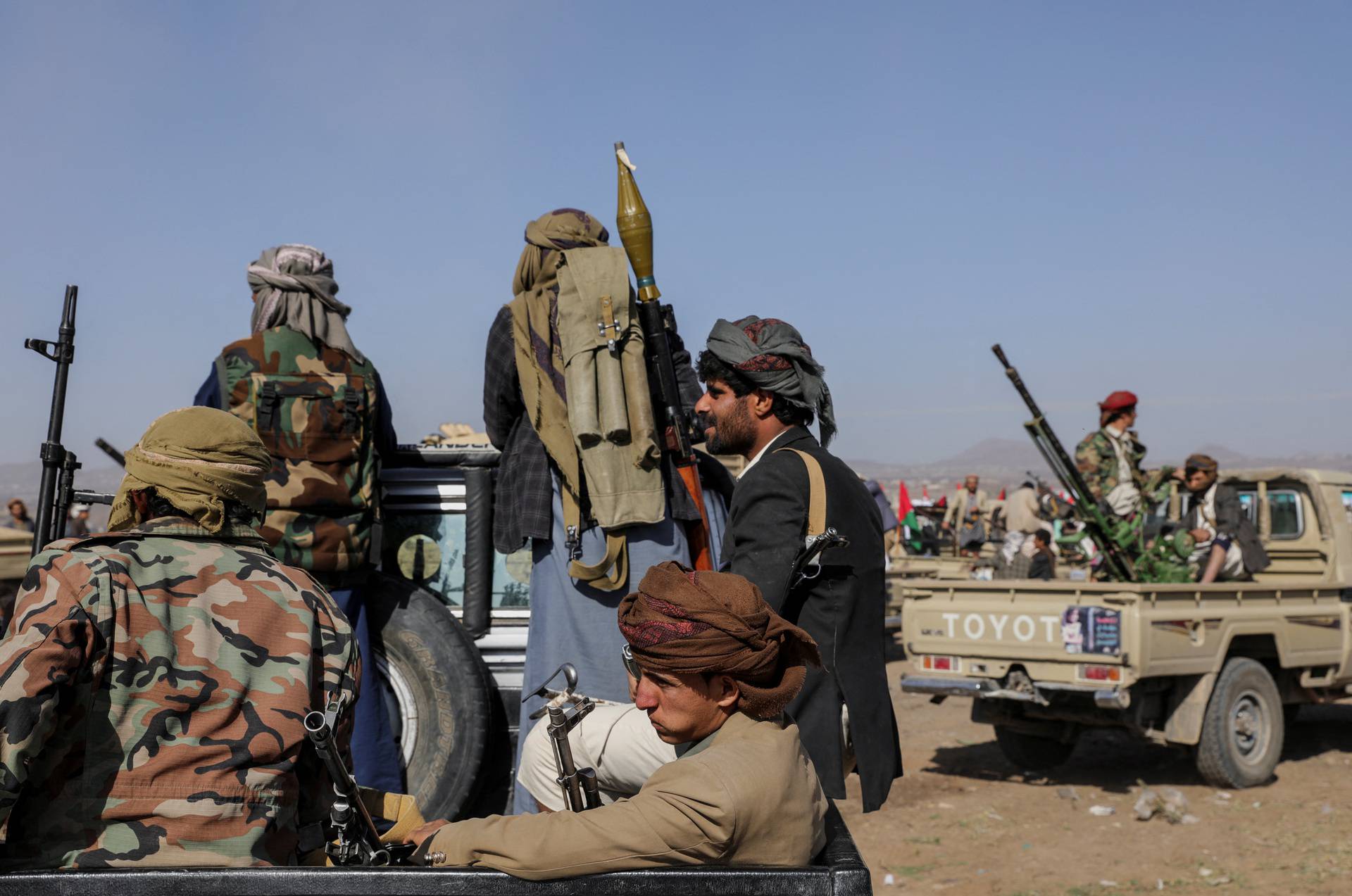 Houthi tribesmen gather to show defiance after U.S. and U.K air strikes on Houthi positions near Sanaa