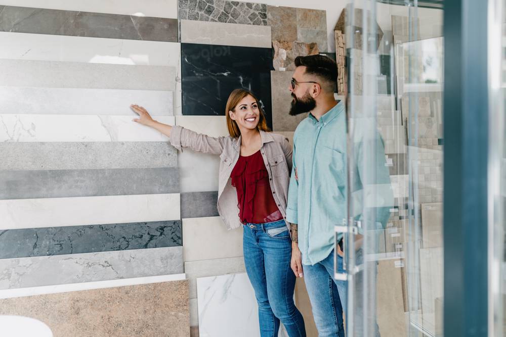 Middle,Age,Couple,Choosing,Ceramic,Tiles,For,Their,New,Bathroom