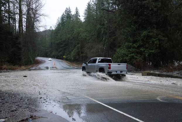 Floodwaters trigger evacuations and highway closures in British Columbia’s Fraser Valley