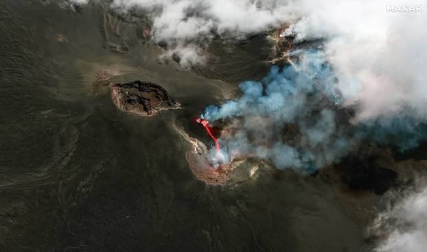 Italy's Mount Etna erupts