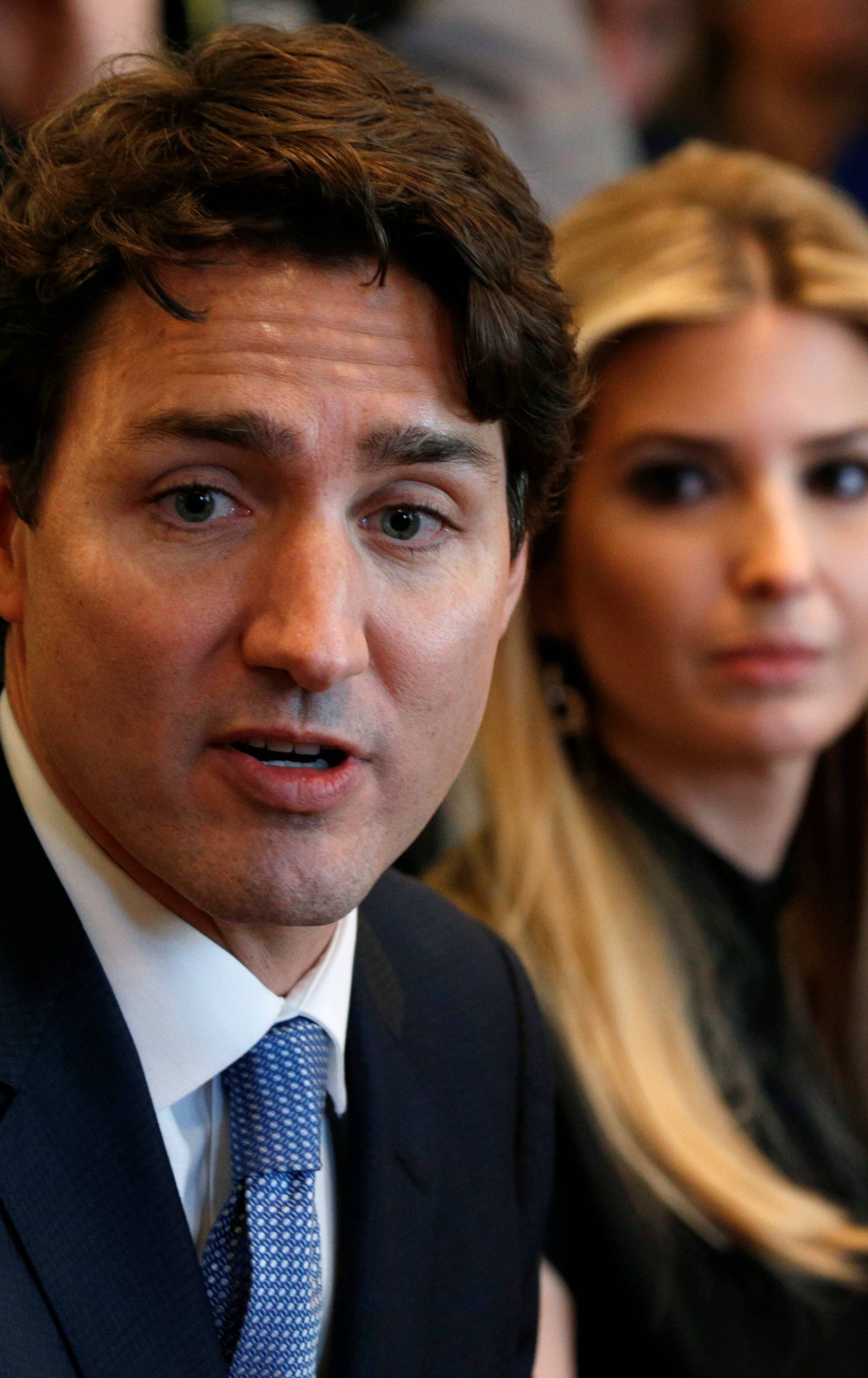 Ivanka Trump looks toward Canadian Prime Minister Justin Trudeau during U.S. President Donald Trump's roundtable discussion on the advancement of women entrepreneurs and business leaders at the White House in Washington