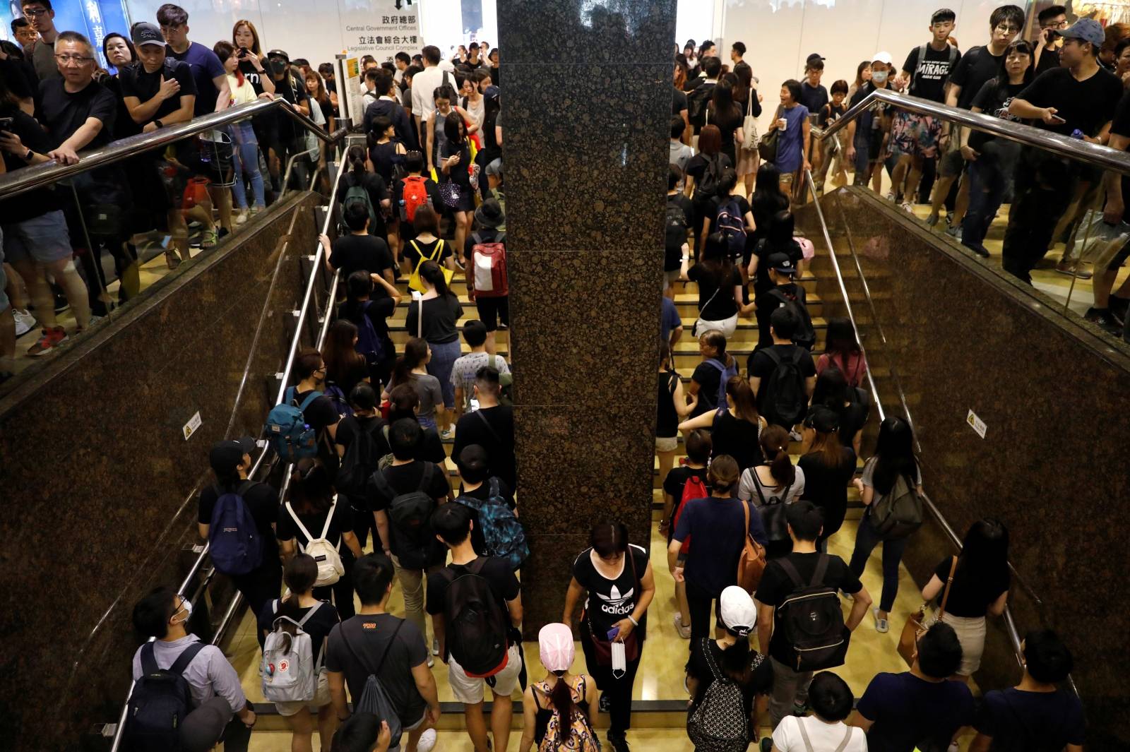 Demonstrators arrive at the Admiralty station of Mass Transit Railway (MTR) to attend a protest in Hong Kong