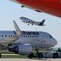 FILE PHOTO: An aircraft of German air carrier Lufthansa takes off from Berlin Brandenburg Airport in Schoenefeld