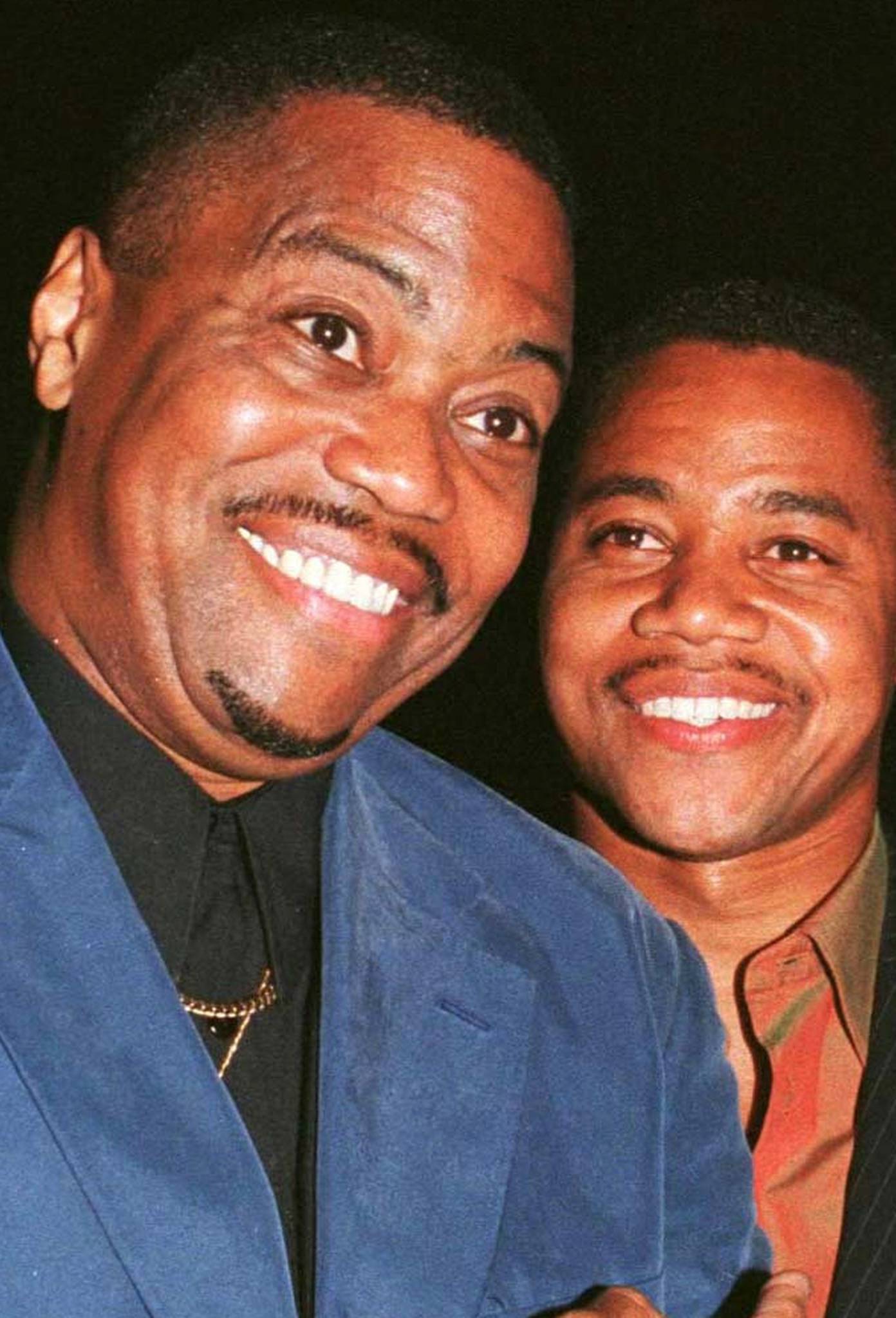 FILE PHOTO: Actor Cuba Gooding, Jr. poses with his father Cuba Gooding, Sr. as they arrive for the film's premiere in Beverly Hills