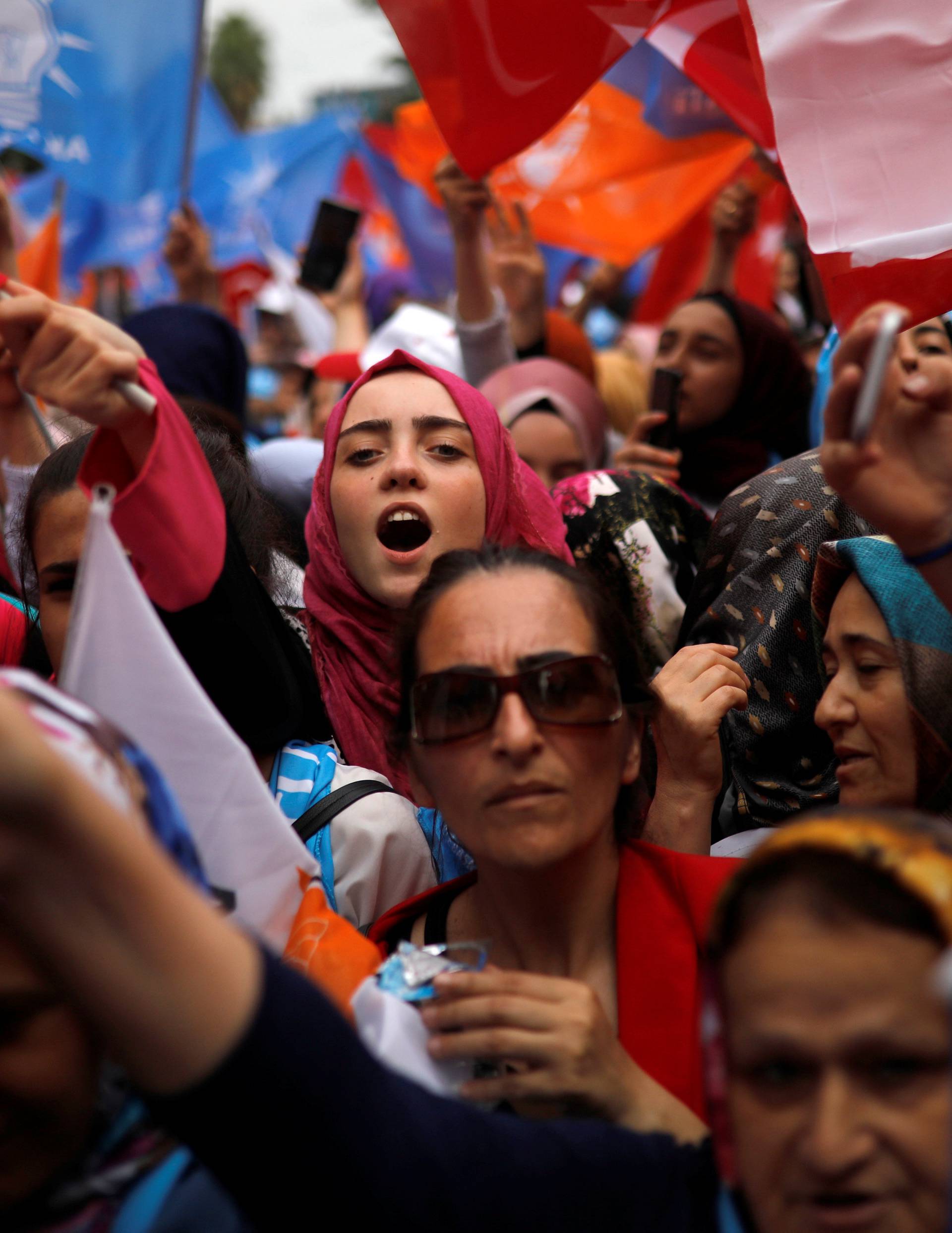 Supporters of Turkish President Tayyip Erdogan attend his election rally in Istanbul