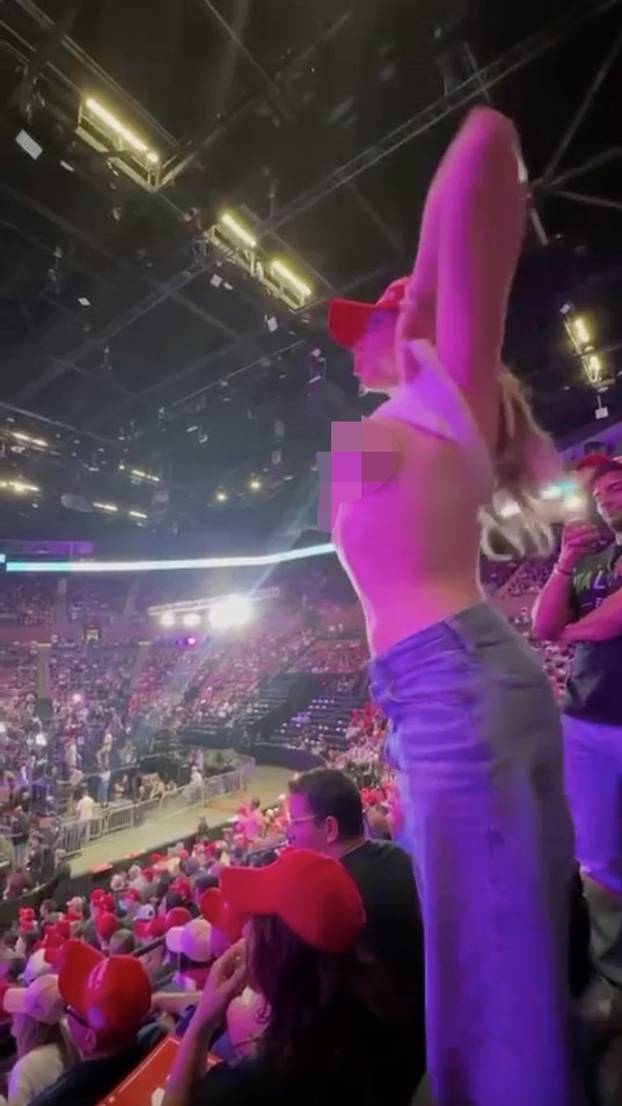 VIDEO: Woman who flashed New York-Dublin portal strikes again at Trump rally