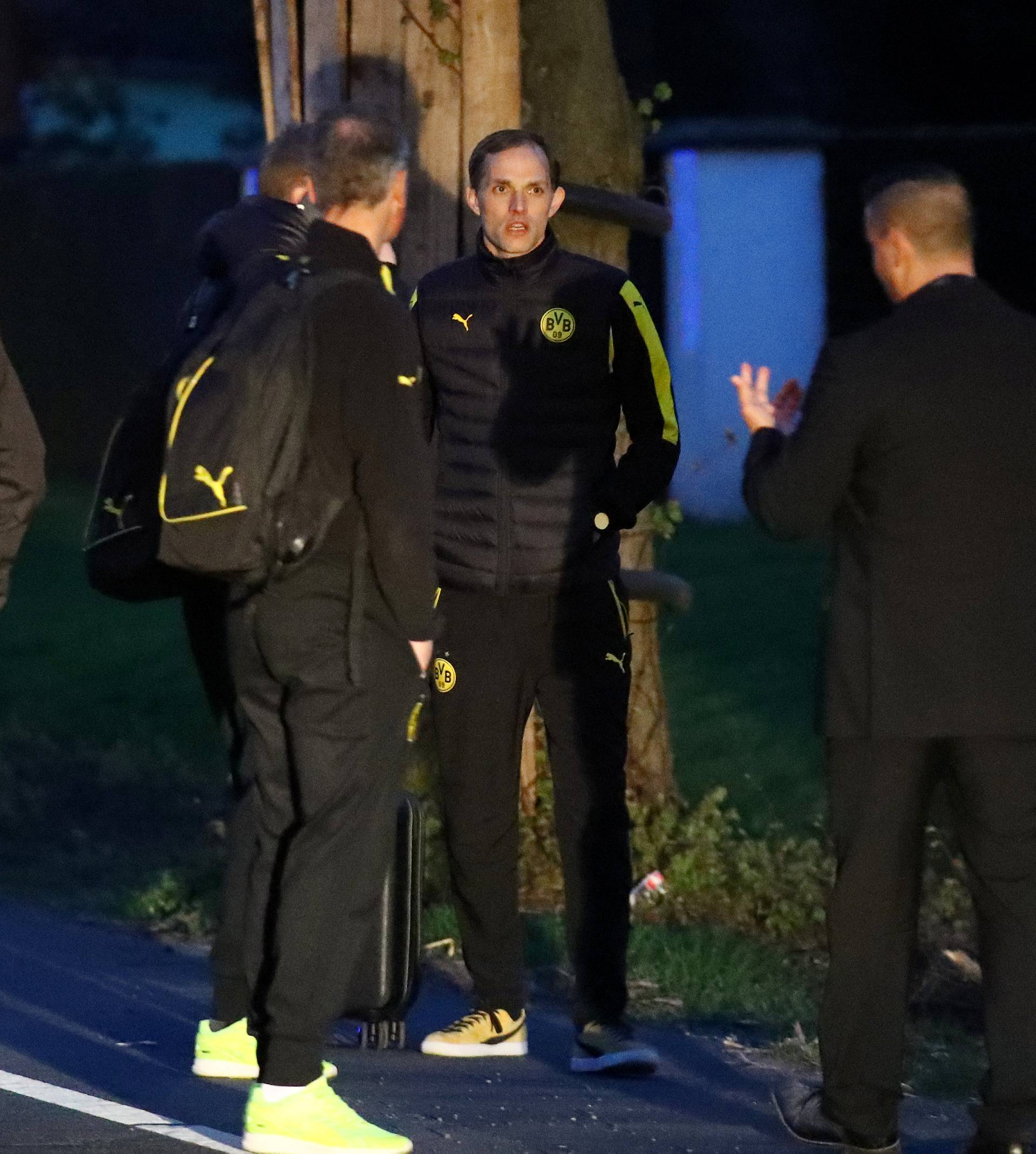 Borussia Dortmund coach Thomas Tuchel is seen by the team bus after an explosion near their hotel before the game