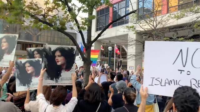 People protest in solidarity with Iranian women, in Toronto