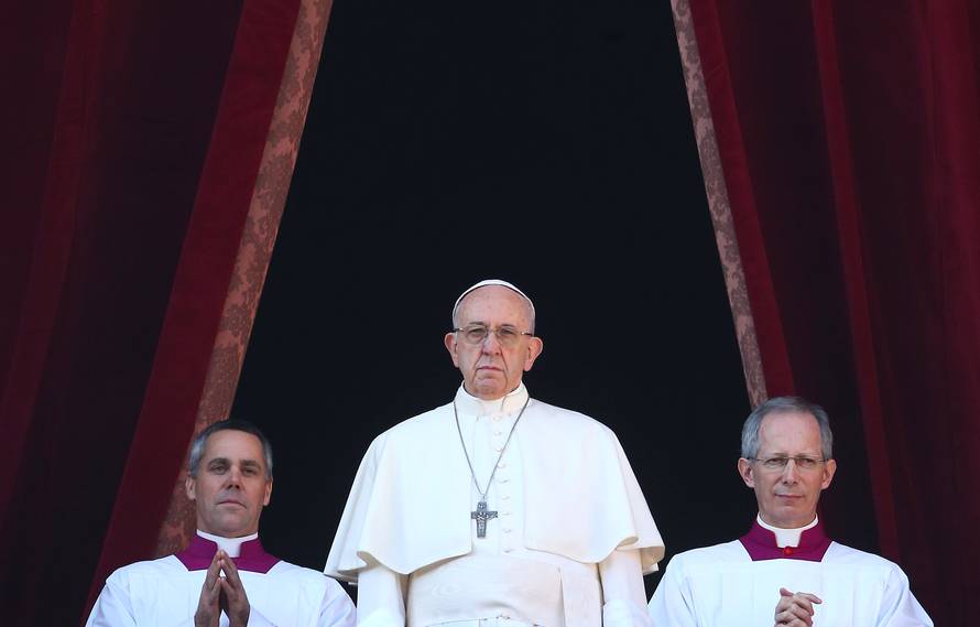 Pope Francis leads the "Urbi et Orbi" message from the balcony overlooking St. Peter's Square at the Vatican
