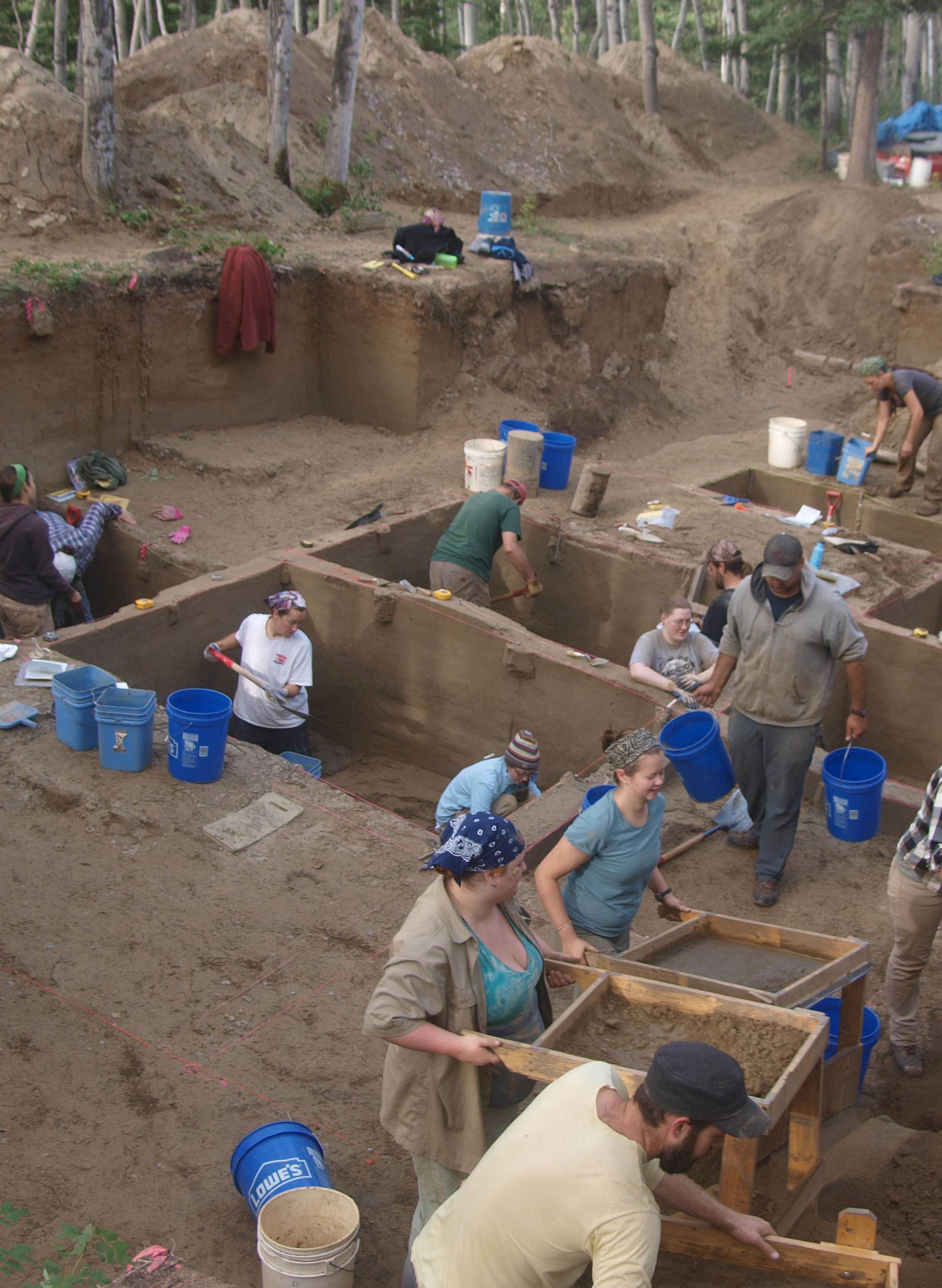 Scientists work at the Upward Sun River discovery site in Alaska's Tanana River Valley