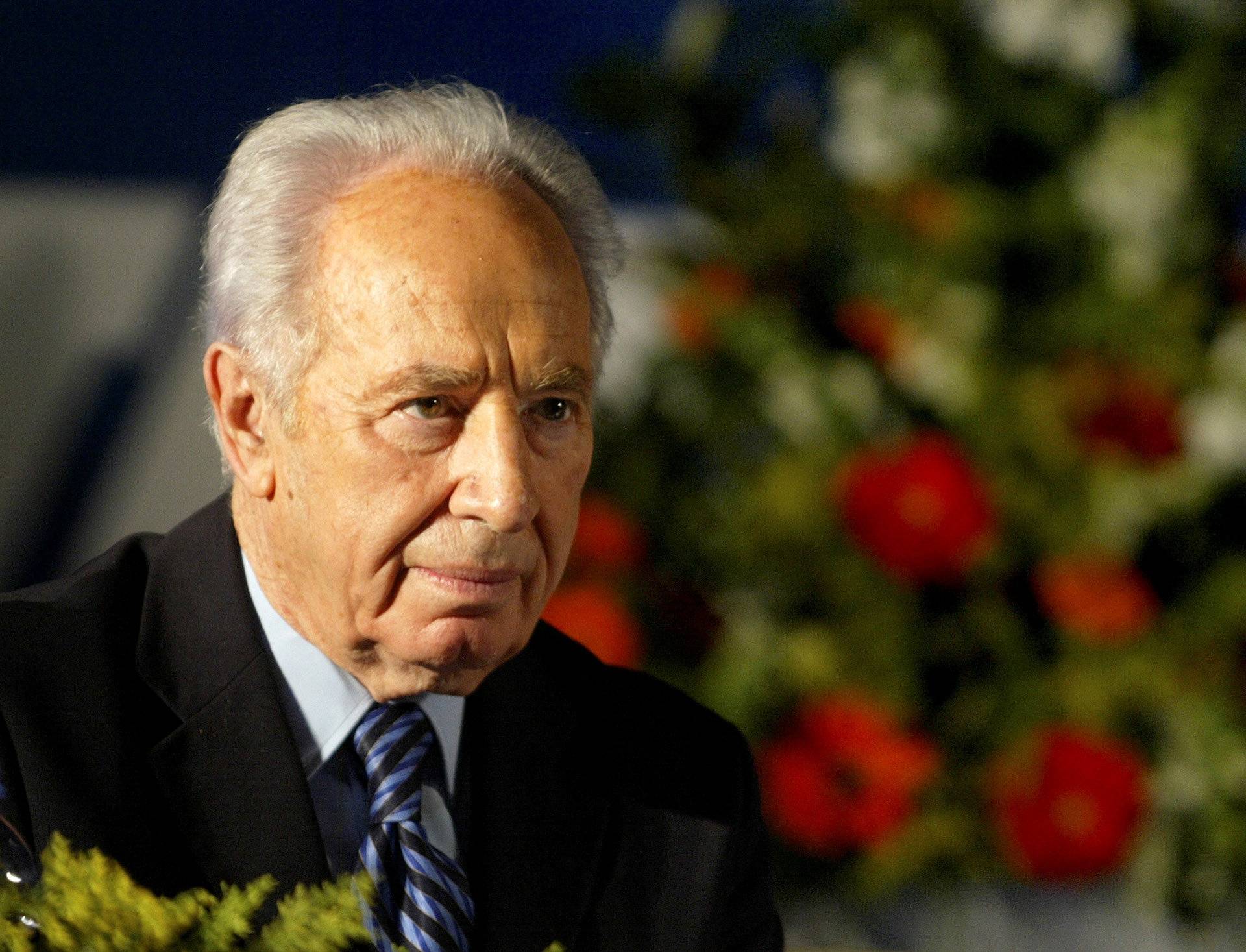 File photo of Labour Party leader Shimon Peres attending his party's conference in Tel Aviv.