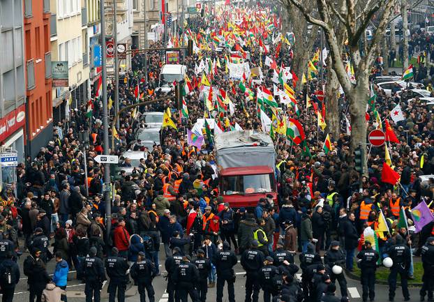 Pro-Kurdish people attend a demonstration in Cologne