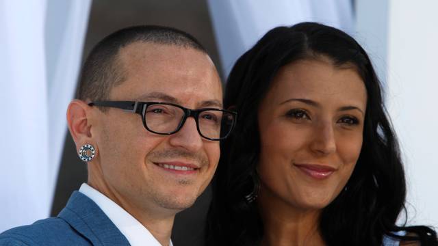 FILE PHOTO: Chester Bennington of Linkin Park and wife Talinda arrive at the 2012 Billboard Music Awards in Las Vegas