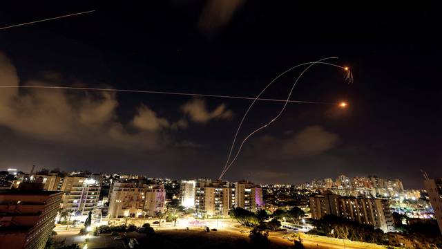 Israel's Iron Dome anti-missile system intercepts rockets launched from Gaza Strip, as seen from Ashkelon