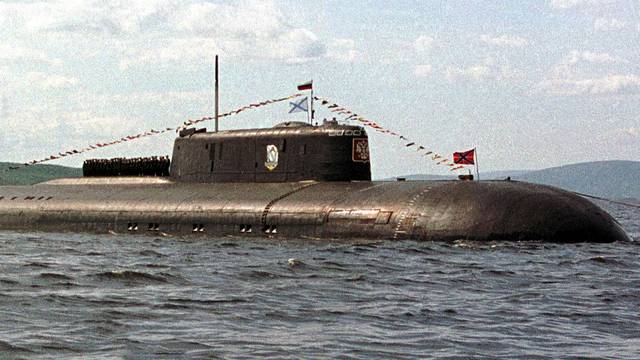 FILE PHOTO: The crew of the Kursk nuclear submarine lines up on the vessel's deck