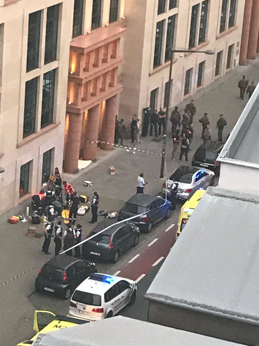 Belgian policemen and soldiers are seen at the scene where a man attacked two soldiers with a knife in Brussels, Belgium August 25, 2017 in this picture obtained from social media