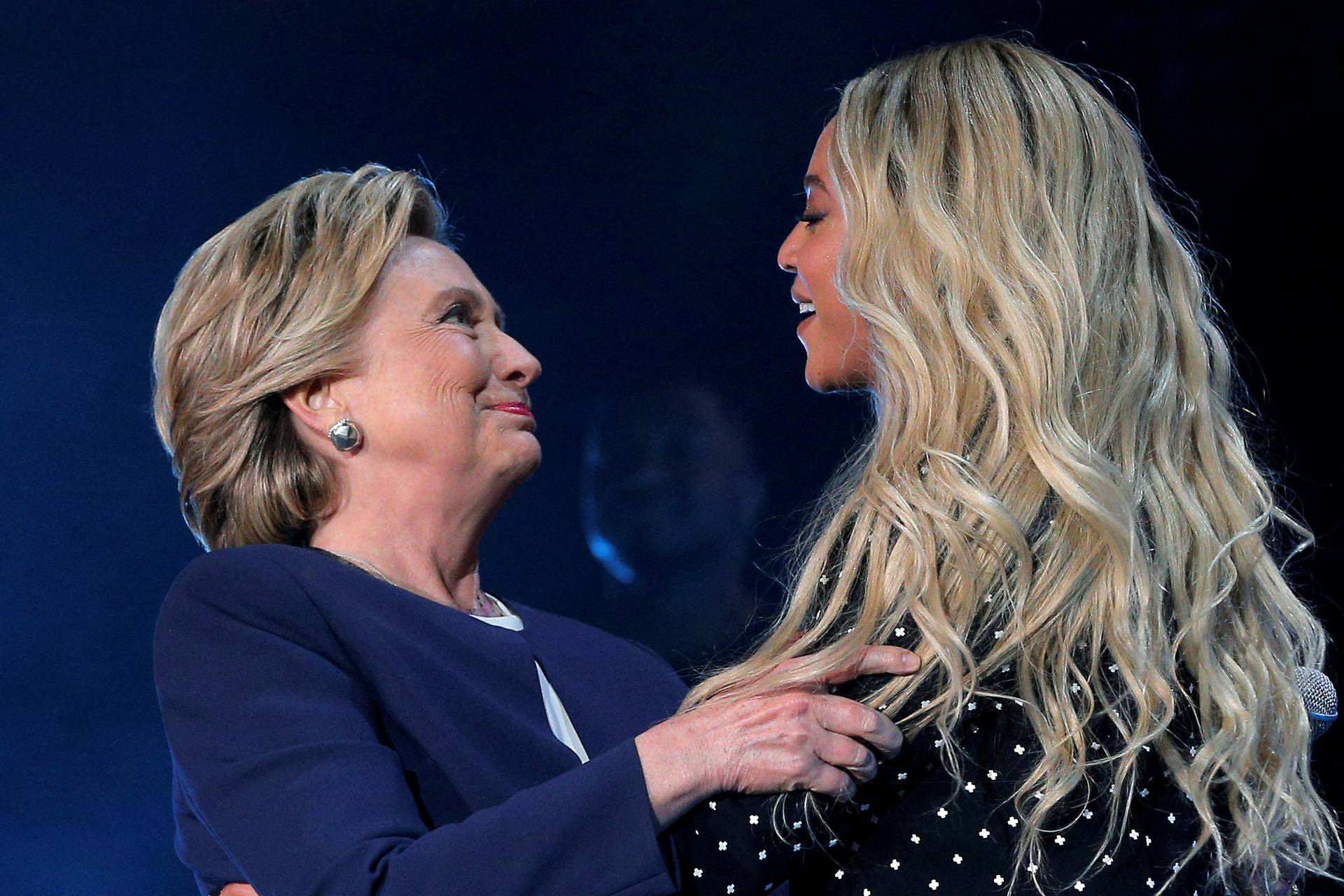 FILE PHOTO: U.S. Democratic presidential nominee Hillary Clinton is joined by artist Beyonce at a campaign concert in Cleveland