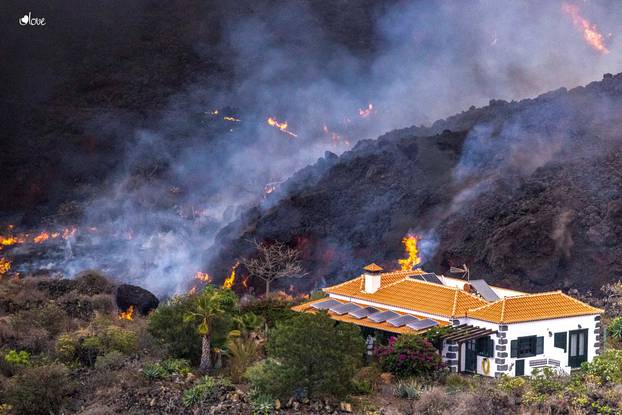 Drone view of home spared from volcanic lava on La Palma