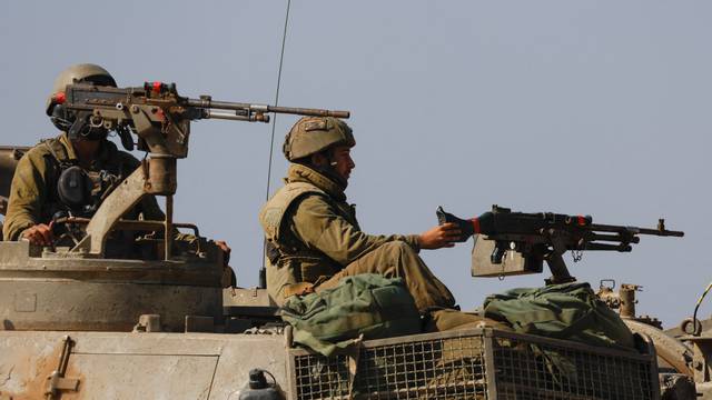 Israeli artillery units near the Israeli side of the border between Israel and the Gaza Strip