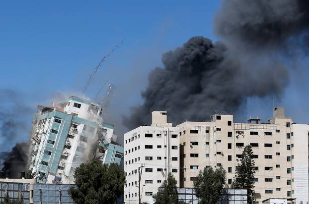 Gaza tower housing AP, Al Jazeera collapses after missile strike in Gaza city