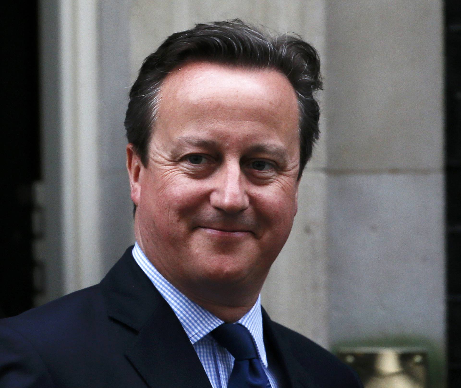 Britain's Prime Minister Cameron leaves Number 10 Downing Street in London