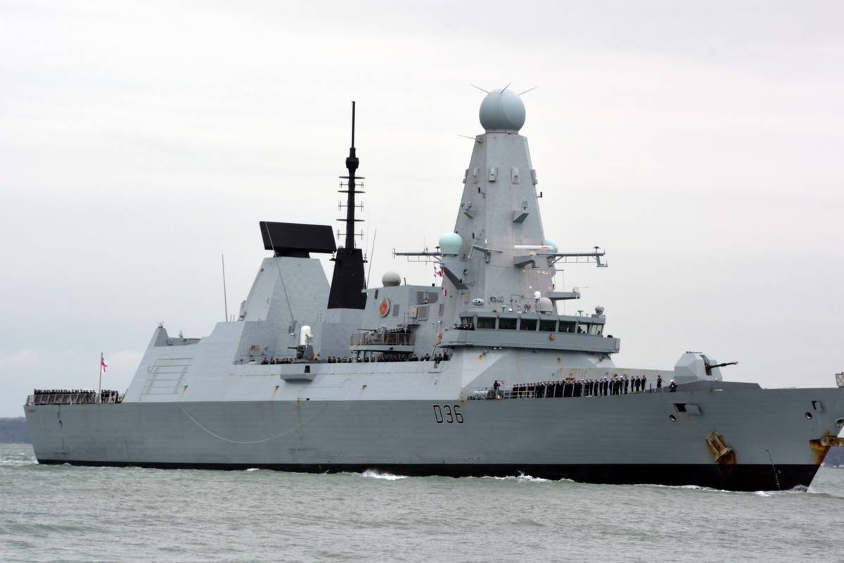 Russian forces fire warning shots at Royal Navy destroyer