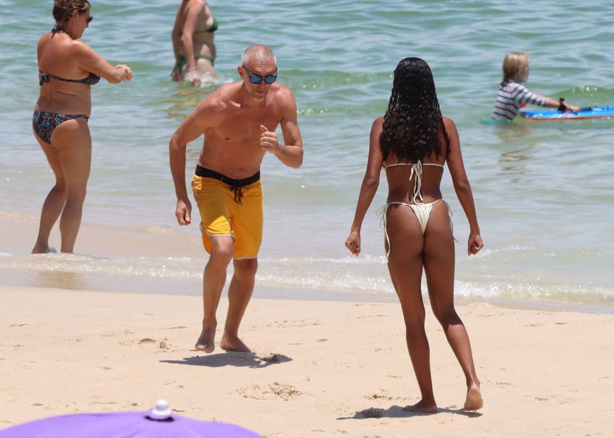 *EXCLUSIVE* Vincent Cassel has some fun with his wife Tina Kunakey on the beach in Rio de Janeiro