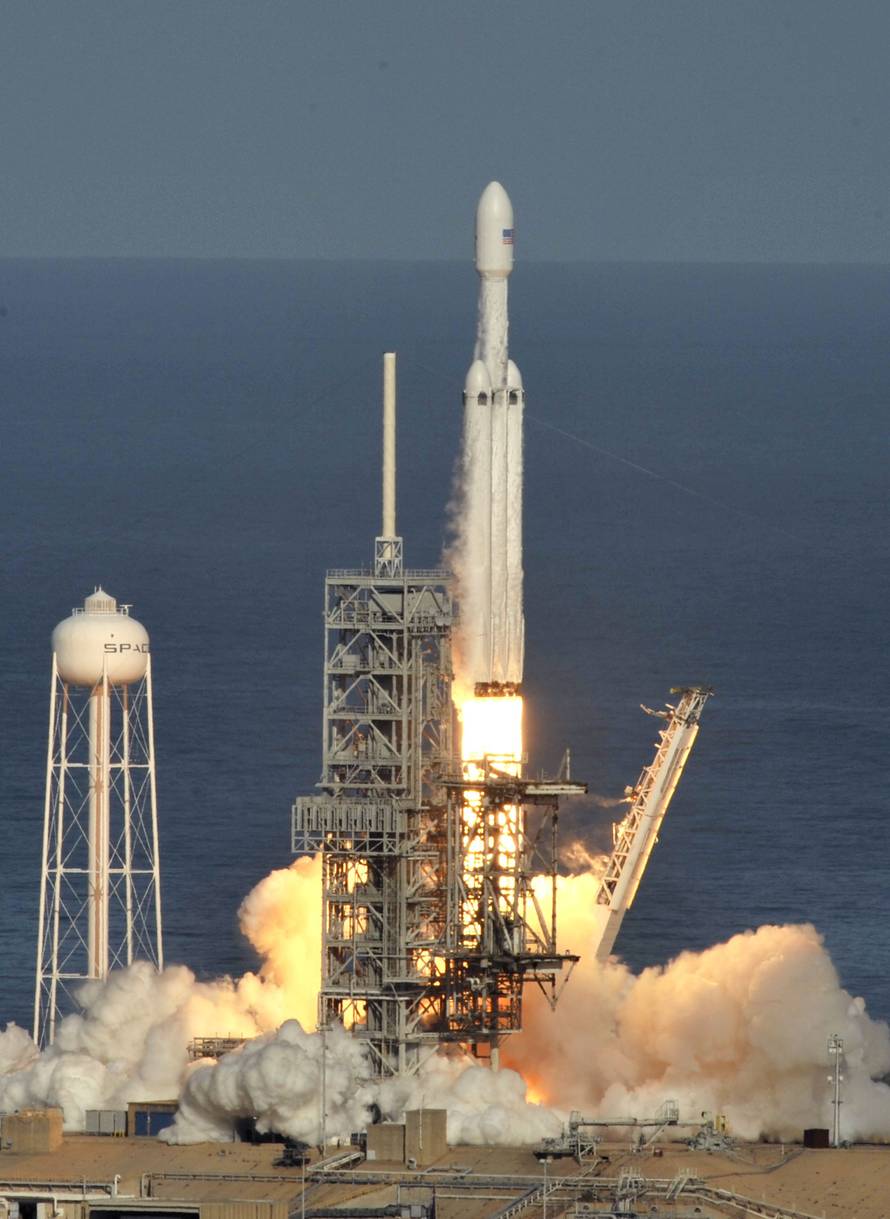 A SpaceX Falcon Heavy rocket lifts off from the Kennedy Space Center in Cape Canaveral