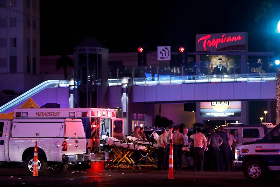 Medical workers stage in the intersection of Tropicana Avenue and Las Vegas Boulevard South after a mass shooting at a music festival on the Las Vegas Strip in Las Vegas