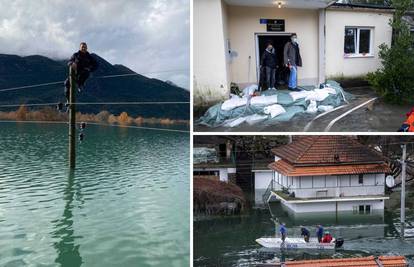 'Ženo, jači sam od poplave': Hrabri radnici penjali se na 11 metara da selu spase struju