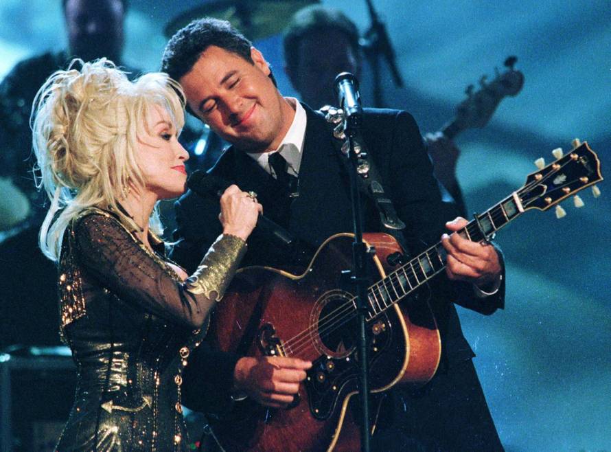 FILE PHOTO: PARTON AND GILL SING DURING CMA AWARDS.