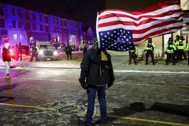 Protest outside the hotel where Bovino, who has been removed from his role, is reportedly staying, in Maple Grove