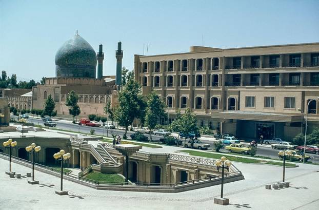 This cityscape image looking towards the Madresse Madac-I-Shah mosque and school and the Chahar Bagh Avenue is one of the main roads in the cultural city of Isfahan as it was in 1978