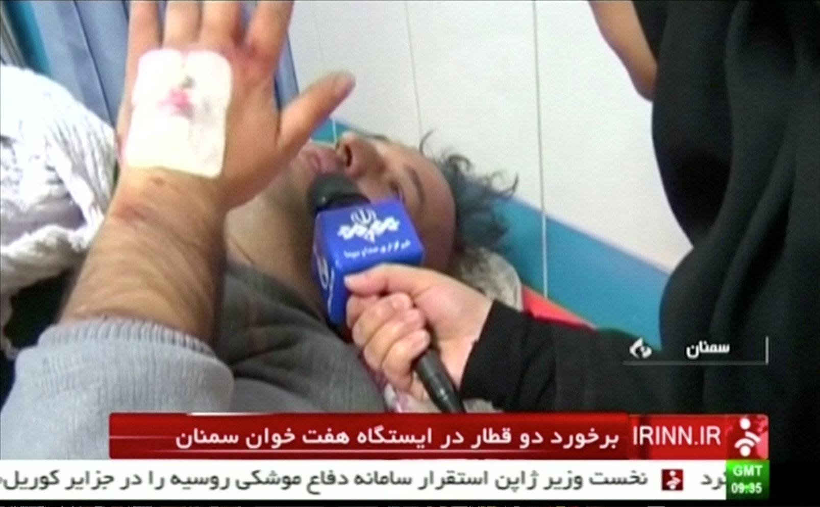 Still frame taken from video show an unidentified male passenger speaking at a local hospital following a collision between two passenger trains in the city of Shahroud, in the north-central province of Semnan, Iran