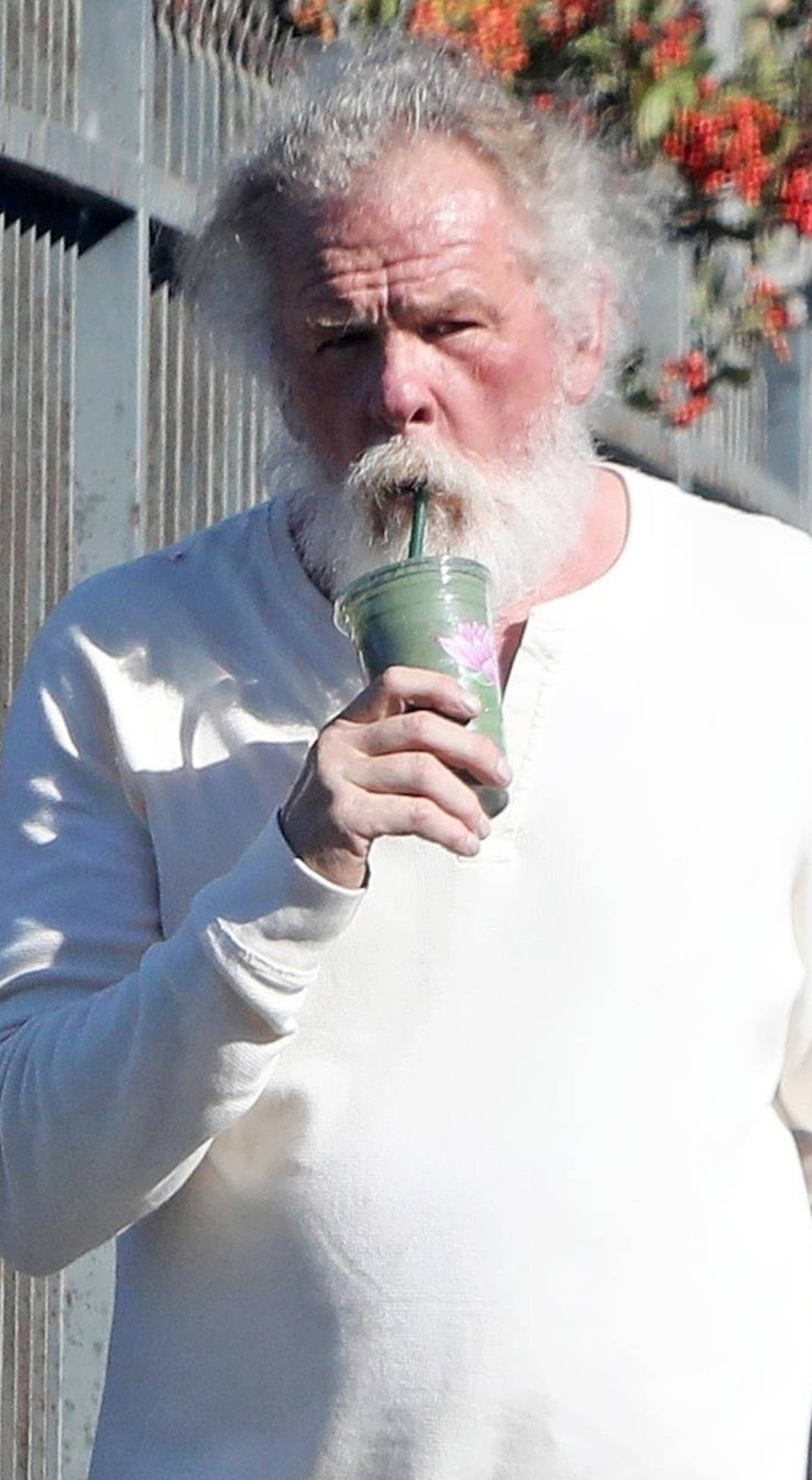 *EXCLUSIVE* Nick Nolte climbs a fence in his PJ's in Malibu