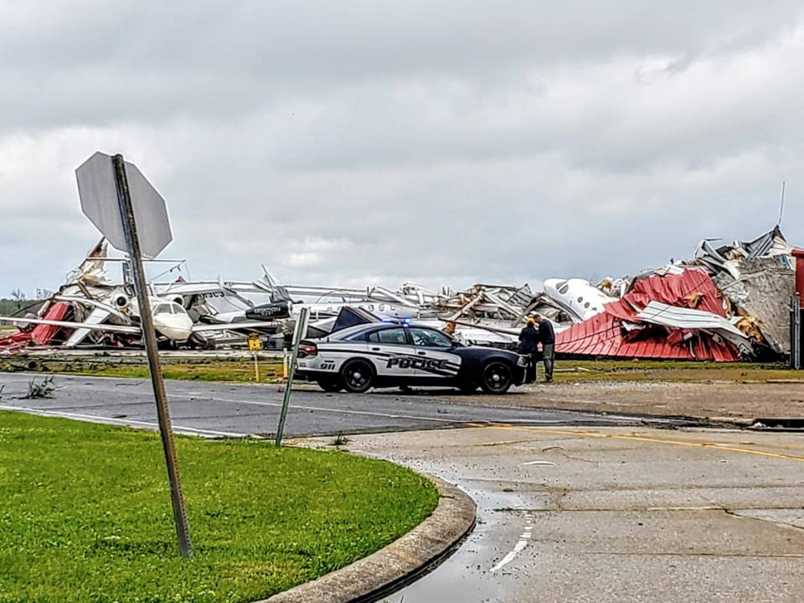 Social media images of damaged planes and buildings in the aftermath of a tornado in Monroe, Louisiana