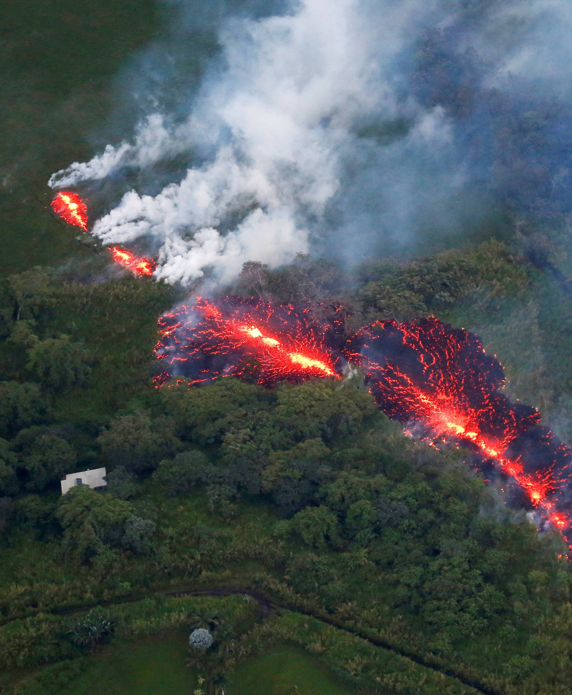 A Picture and its Story: Burning lava, hot ash: Kilauea's human toll