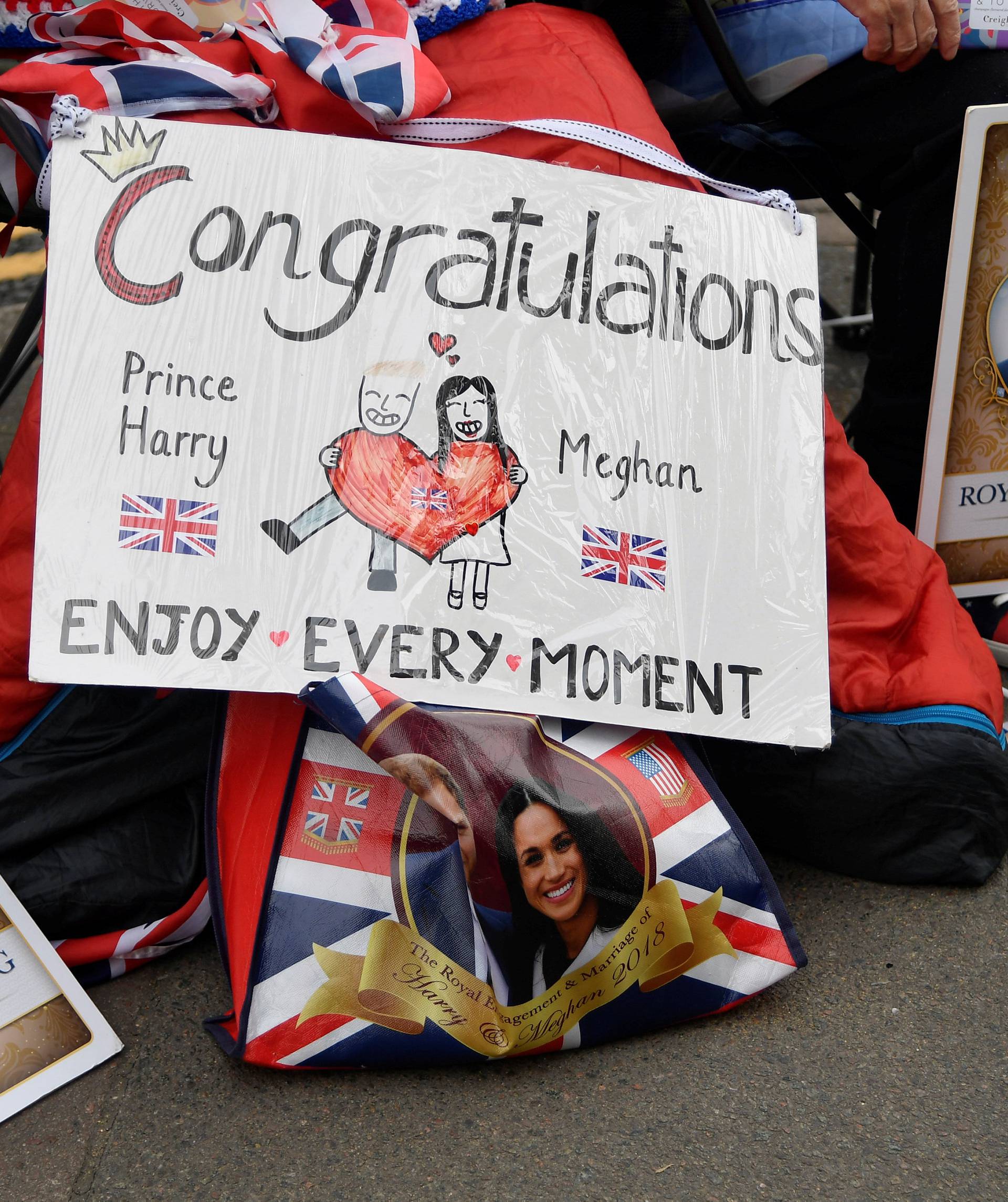 Goodwill messages are seen beside royal fans outside of  Windsor Castle, the location for the forthcoming wedding of Britain's Prince Harry and his fiancee Meghan Markle, in Windsor, Britain