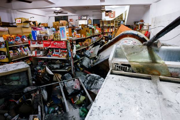A damaged convenience store, after flooding brought by Super Typhoon Ragasa in Hualien