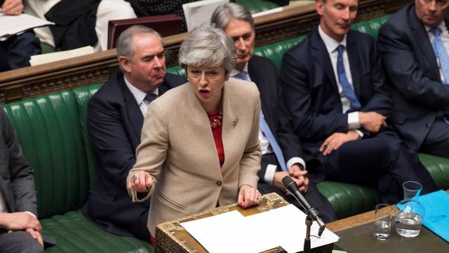 British Prime Minister Theresa May speaks at the House of Commons in London