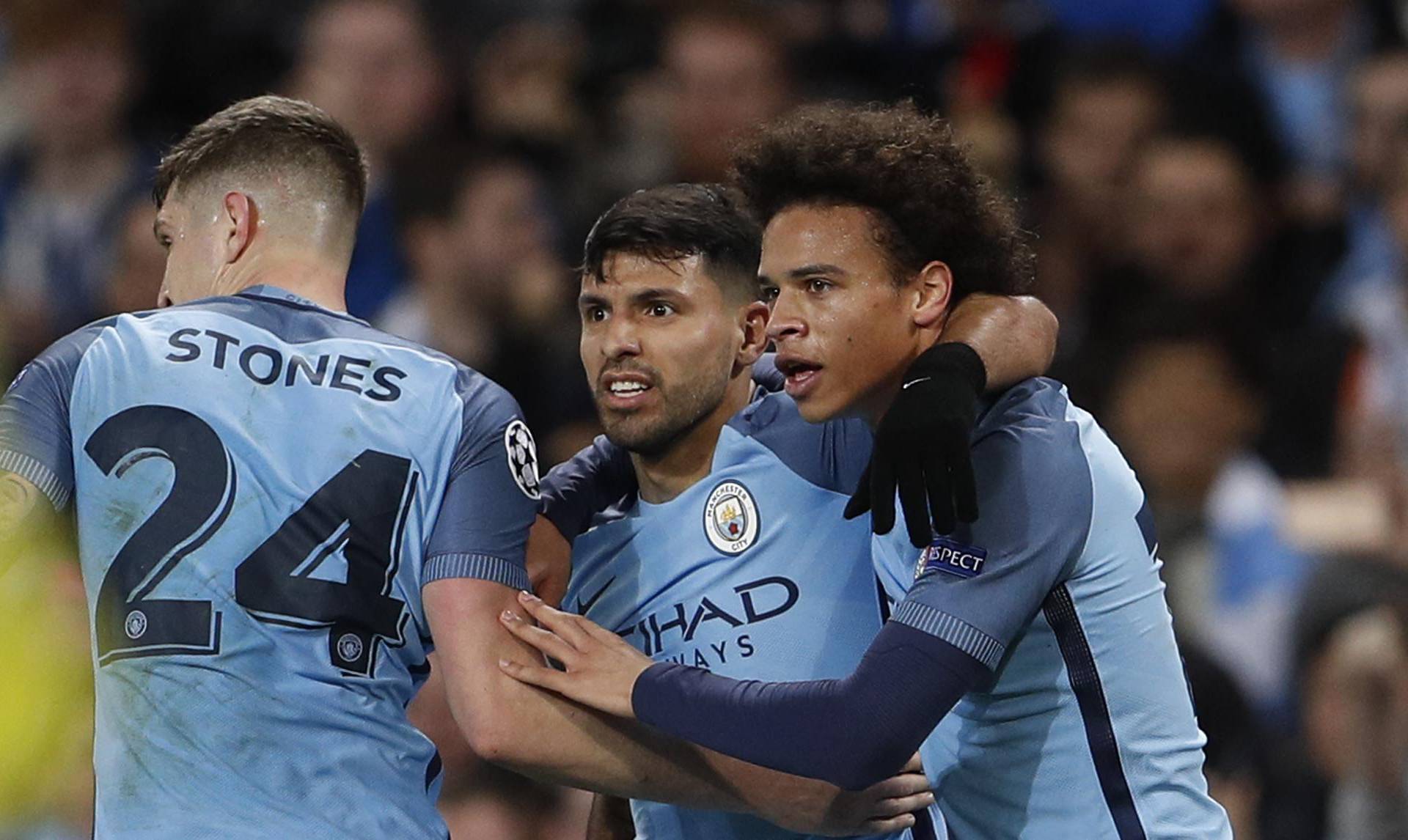 Manchester City's Sergio Aguero celebrates scoring their third goal with team mates